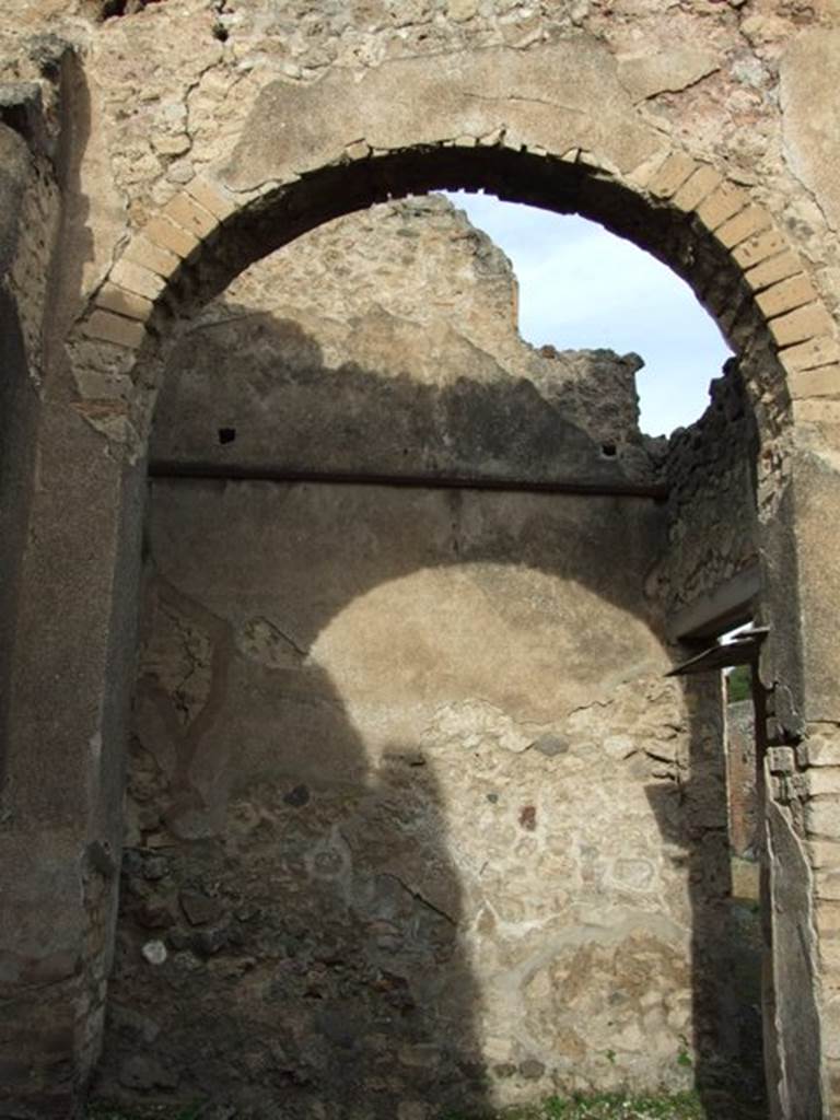 IX.5.2 Pompeii. December 2007. Room 16, high arched entrance to kitchen. Looking north.