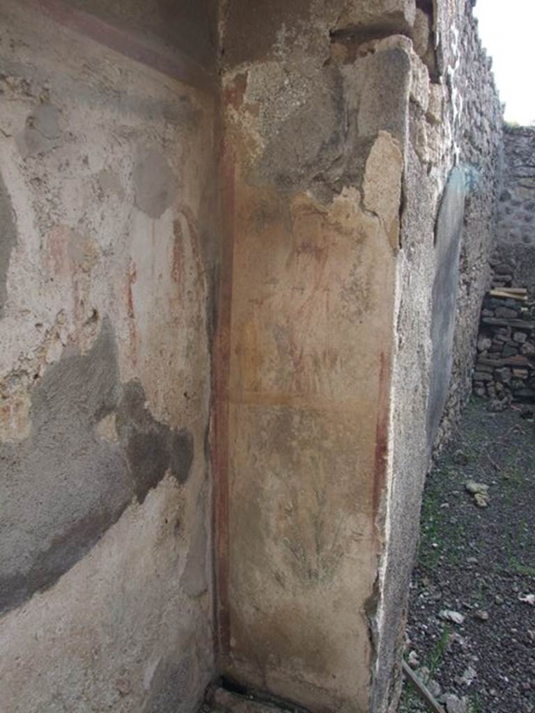 IX.5.2 Pompeii. December 2007. Room ‘w’, remains of painting on household shrine south side wall.