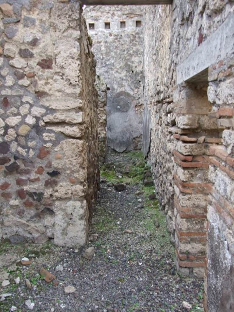 IX.5.2 Pompeii. December 2007.
Corridor on south-east corner of peristyle ‘p’. leading to rooms ‘x’ and ‘y’, on left and ahead.
On the right is the small doorway into room ‘v’.