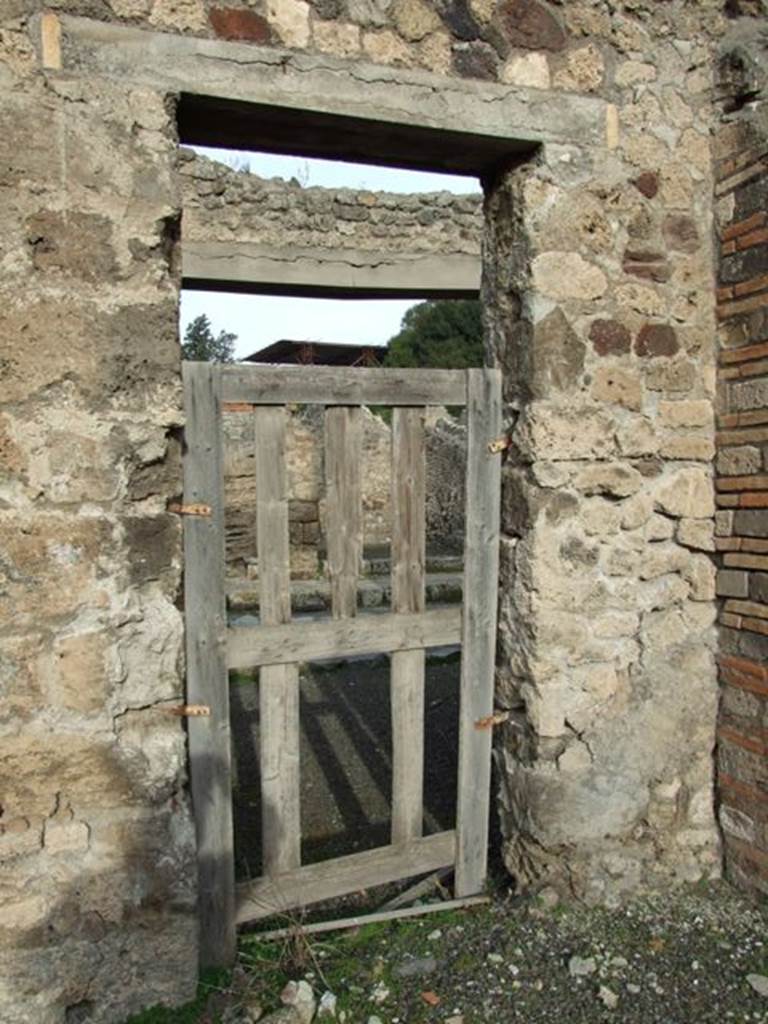IX.5.2 Pompeii. December 2007. Doorway on north-east corner of atrium connecting to IX.5.3.
