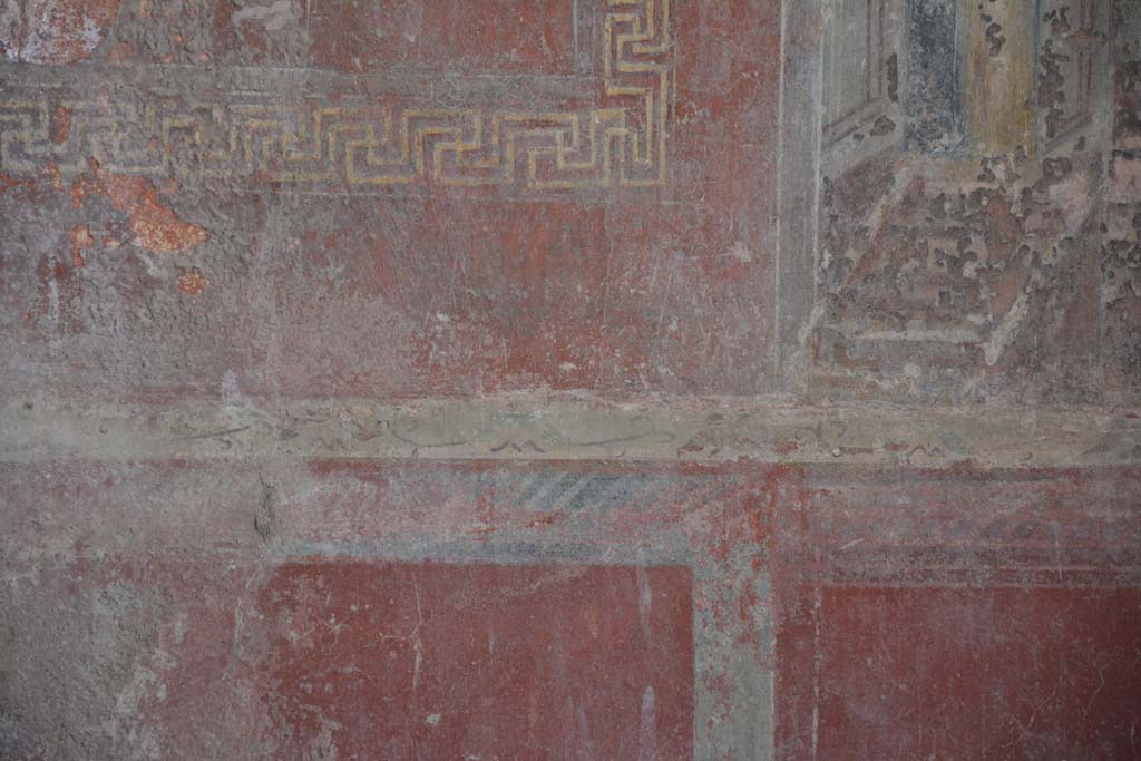 IX.5.6 Pompeii. May 2017. Room i, detail of painted decorations from above zoccolo in centre of west wall.
Foto Christian Beck, ERC Grant 681269 DÉCOR.