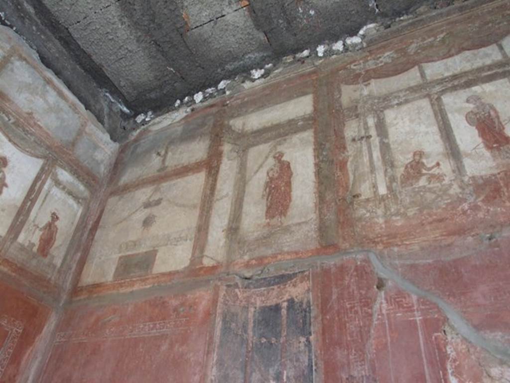 IX.5.6 Pompeii. December 2007. Room 10, west wall of tablinum. Wall painting of figures or gods at high level.