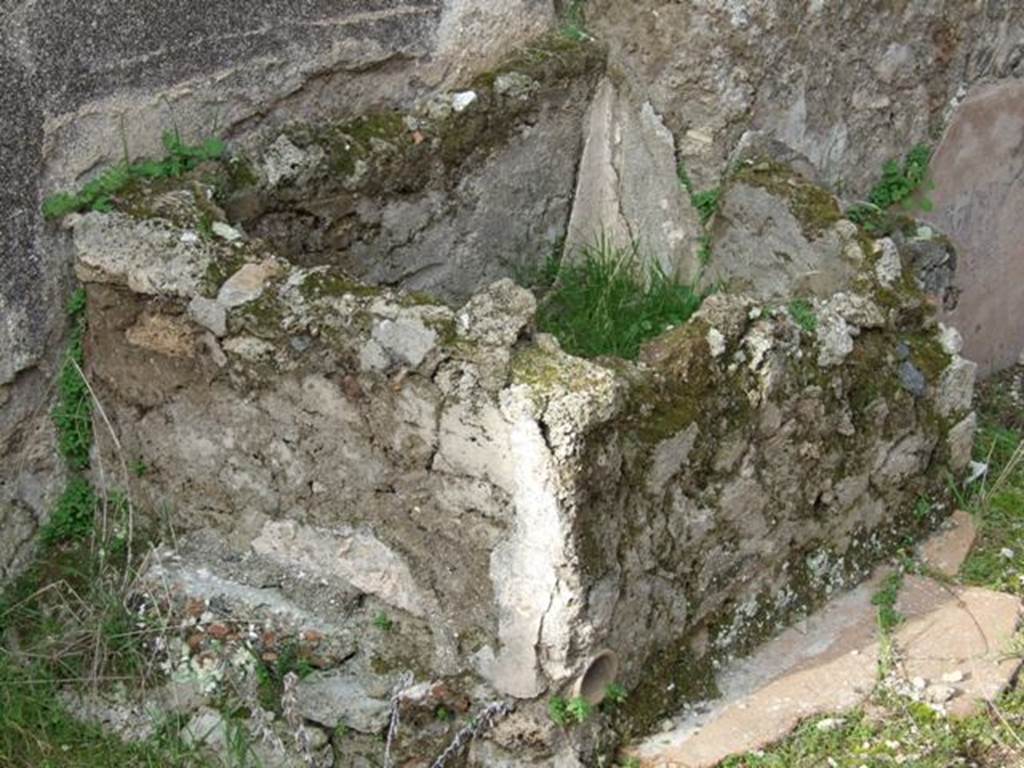 IX.5.6 Pompeii. December 2007. Room u, masonry basin with water pipe, to south of room 13 on west wall of garden area. According to both Richardson and Jashemski, near this basin four marble heads were found, including an Epicurus and two other philosophers. See Richardson, L., 1988. Pompeii: an Architectural History. Baltimore: John Hopkins University Press. Jashemski said that three were heads of men, one of a woman. All were of the same marble and excellent workmanship. Mau thought they were to be attached to a wall, Dwyer suggested that they may have been cut to place back-to-back as double herms. Although, under examination he found that no two heads fitted together. The marble heads are now in the Naples Archaeological Museum, inventory numbers 111389, 111390, 111391 and 111392.
See Jashemski, W. F., 1993. The Gardens of Pompeii, Volume II: Appendices. New York: Caratzas. (p.236) According to Pompeii, the richest series of little busts of philosophers was found here, Demosthenes, one alleged to portray Seneca, Epicurus and a woman, perhaps Leontion, the philosopher’s student and companion. See Panetta, M.R. (ed): Pompeii, the history, life and art of the buried city. Italy, White Star Publishers: (p.269)