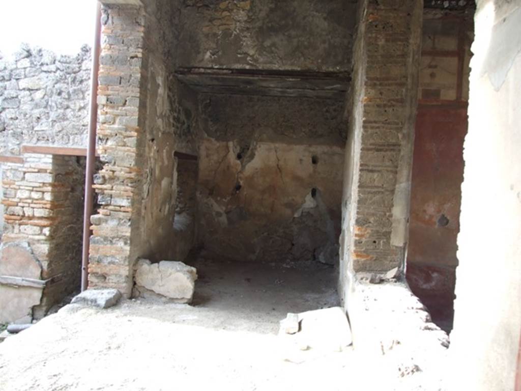 IX.5.6. December 2007. Room 9. Looking west across the rear of the tablinum.