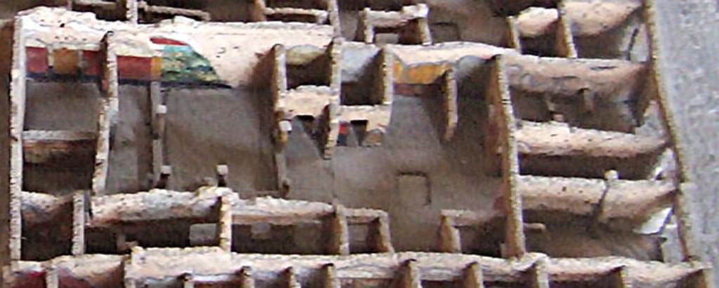 IX.5.9 Pompeii. House as recorded on the model in Naples Archaeological Museum.
Note the colourful painting that was on the west wall of the peristyle.
According to Jashemski, there was a large animal painting, only partially preserved upon excavation, on the west wall.
See Jashemski, W. F., 1993. The Gardens of Pompeii, Volume II: Appendices. New York: Caratzas. (p.237 & No.94 on p.366)