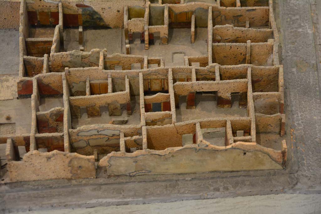 IX.5.11 Pompeii. July 2017. Looking west from Vicolo del Centenario, towards doorway at IX.5.13, lower centre and right.
The entrance doorway at IX.5.11 is on the Via di Nola, on the lower right.
The upper house is IX.5.9.
From cork model in Naples Archaeological Museum.
Foto Annette Haug, ERC Grant 681269 DÉCOR.
