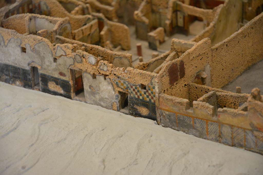 IX.5.17 Pompeii. 2017. Detail from model in Naples Archaeological Museum.
Looking north to doorways in unnamed vicolo between IX.5 and IX.6, with IX.5.17, in centre.
Foto Taylor Lauritsen, ERC Grant 681269 DÉCOR.