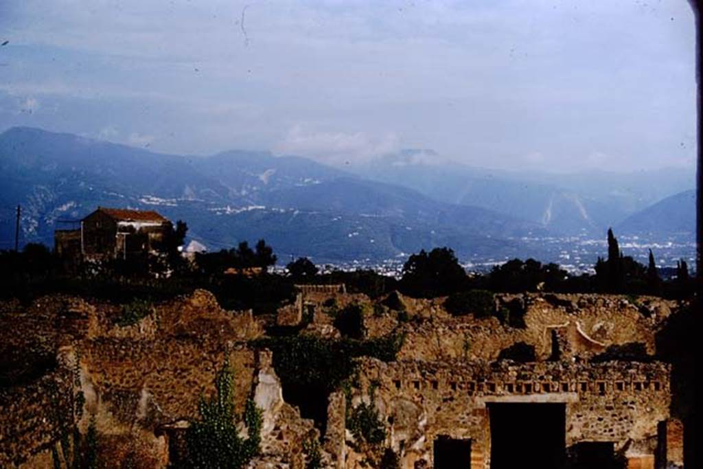 IX.5.18 Pompeii. 1964. Looking south across Pompeii.
The entrance corridor from the inside of the atrium of IX.5.18 can be seen in the lower right, with the doorway to room h, on its left.
Photo by Stanley A. Jashemski.
Source: The Wilhelmina and Stanley A. Jashemski archive in the University of Maryland Library, Special Collections (See collection page) and made available under the Creative Commons Attribution-Non-Commercial License v.4. See Licence and use details.
J64f1257