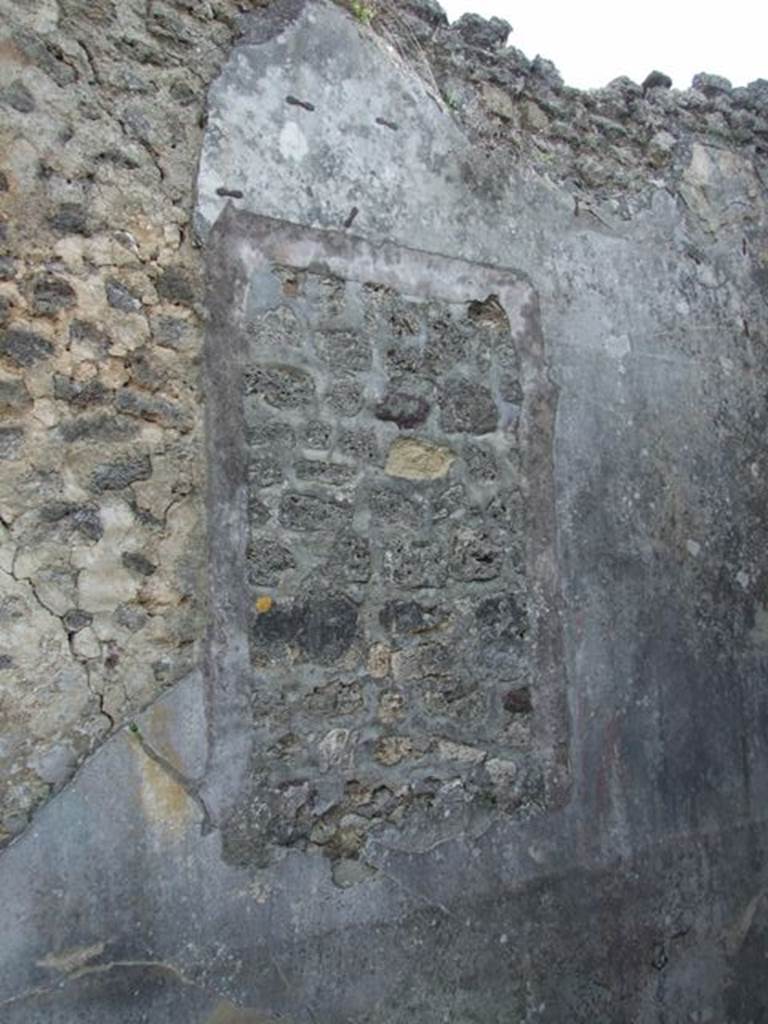 IX.5.18 Pompeii. March 2009. Room g, south wall of cubiculum with site of wall painting of Pan and the Nymphs. Now in Naples Archaeological Museum. Inventory number: 111473.
The south wall had a central aedicula containing the painting of Pan and the Nymphs.

