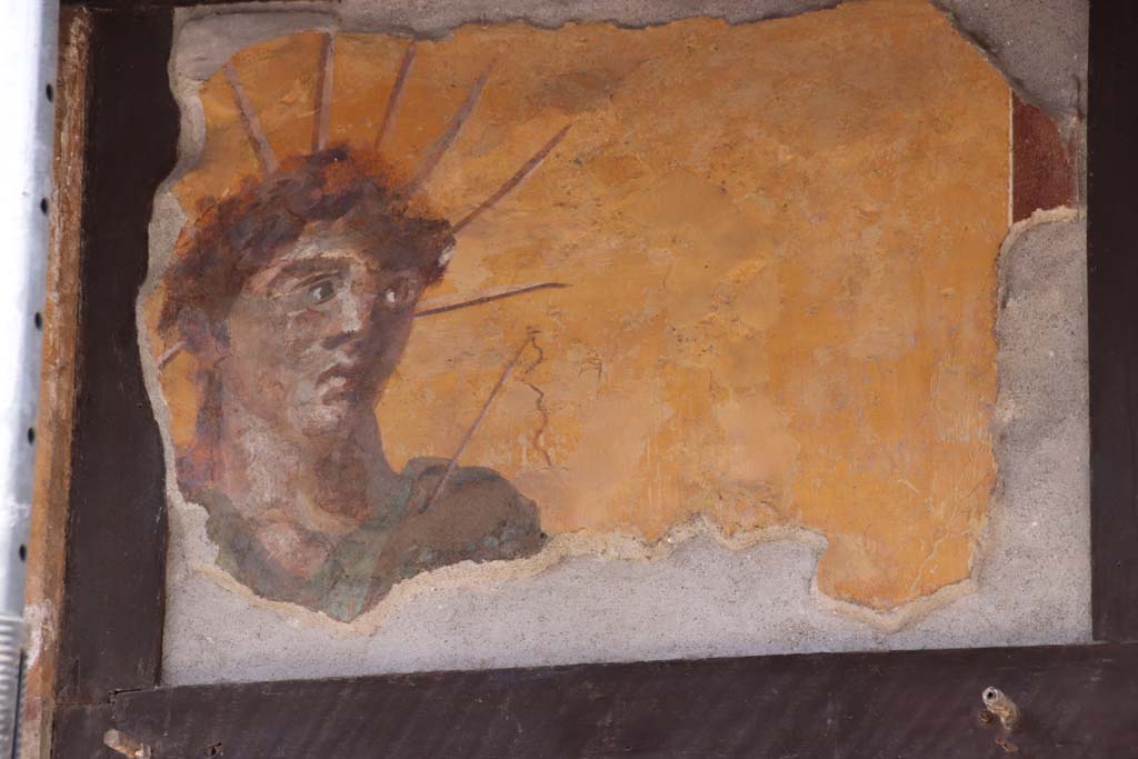 IX.7.1 Pompeii. September 2019. Painting of Apollo or Sol with the cosmic crown and a whip.
Photo courtesy of Klaus Heese.