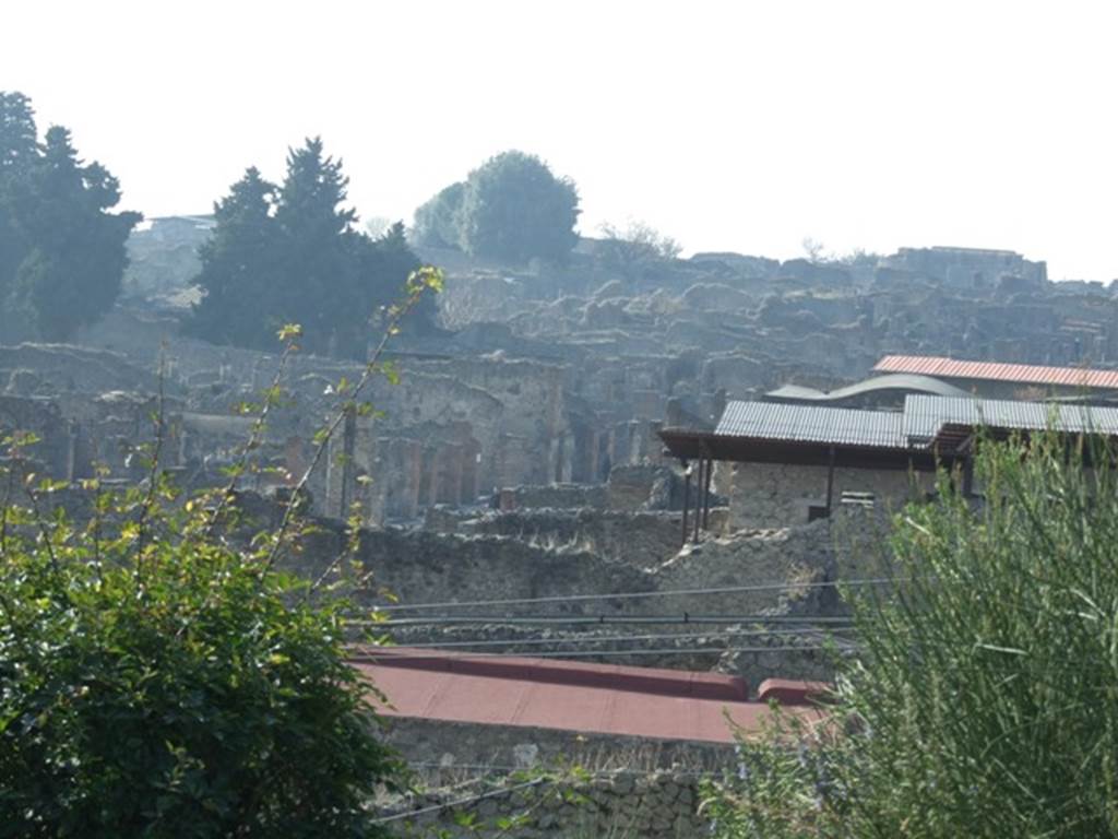 View looking west along the Via dell’Abbondanza, taken from above IX.7.12. December 2007.