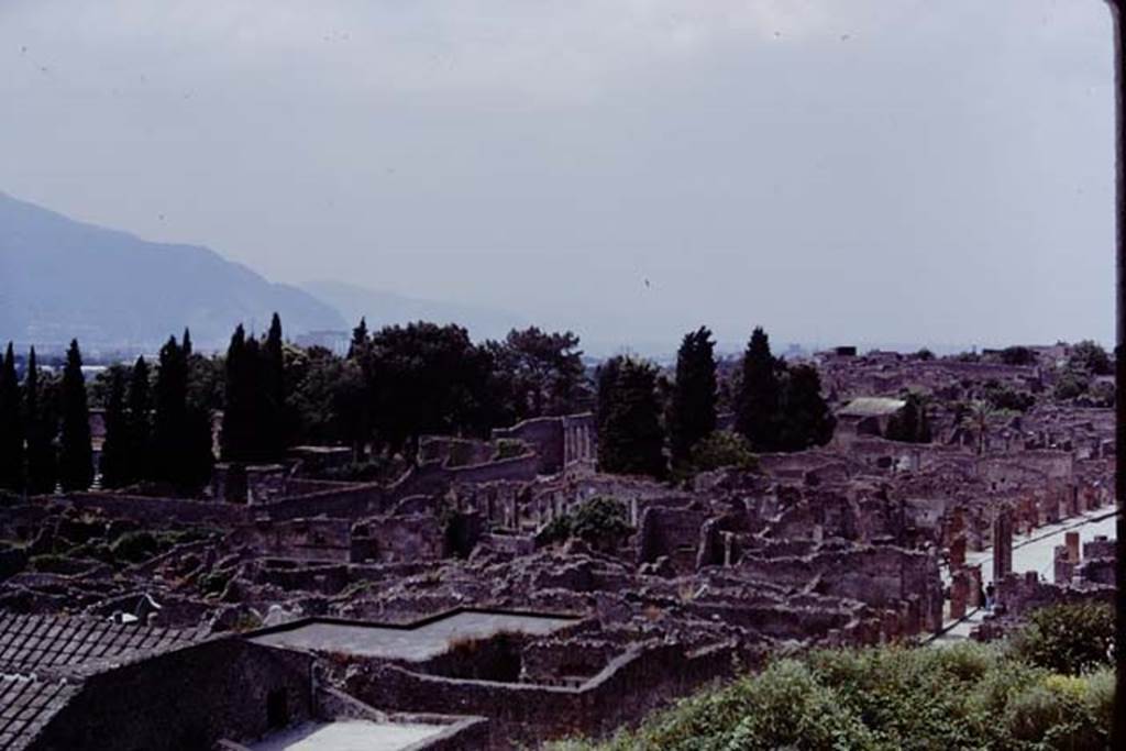 View looking south-west towards the Triangular Forum, centre, taken from above IX.7.12. Pompeii. 1973. Photo by Stanley A. Jashemski.
Source: The Wilhelmina and Stanley A. Jashemski archive in the University of Maryland Library, Special Collections (See collection page) and made available under the Creative Commons Attribution-Non Commercial License v.4. See Licence and use details. J73f0234
