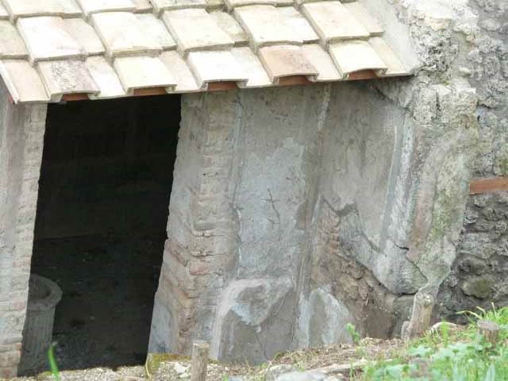 IX.7.16 Pompeii. May 2010. Cubiculum on north side of entrance.
Jashemski says that this room, according to Mau, had a garden scene in the centre of the side panels on each wall, other than on the north, which had been painted later.
Mau did not describe the paintings, and they are no longer visible.
See Mau, BdI, 1883, (p.126-133)
See Jashemski, W. F., 1993. The Gardens of Pompeii, Volume II: Appendices. New York: Caratzas. (p.401)
According to Dawson, -
• On the entrance (east) wall, right of doorway was - Perseus & Andromeda, p. 84, pl. IV.
• On the left (south) wall was - Rape of Hylas, p. 85, pl. III.
• On the rear (west) wall was - Trojan Horse, p. 85, pl. IV.
• On the right (north) wall was – a sacred landscape, p. 86.
See Dawson, C. 1944. Romano-Campanian Mythological Landscape Painting.
See Schefold, K., 1962. Vergessenes Pompeji. Bern: Francke. (Fig.11, 2).
See Catalogue, 1989. Italienische Reise: Pompejanische Bilder in den deutschen archaeologischen Sammlungen. Napoli: Bibliopolis. p. 241-244, fig 81.
See Peters, W.J.T. (1963): Landscape in Romano-Campanian Mural Paintings. The Netherland, Van Gorcum & Comp. (p. 77-78, figs. 61, 62 & 63)
