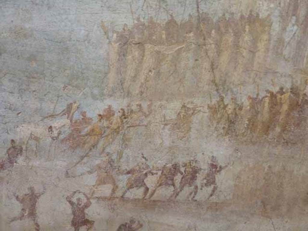 IX.7.16 Pompeii. Found on west wall of cubiculum on north side of entrance. Detail of painting of the Trojan Horse. The Trojans drag the wooden horse to the walls of Troy.