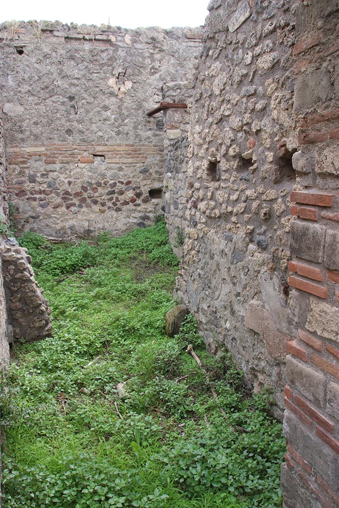 IX.7.16 Pompeii. October 2024.
Looking south-west from doorway into room 3, and through into room “d”. Photo courtesy of Klaus Heese.