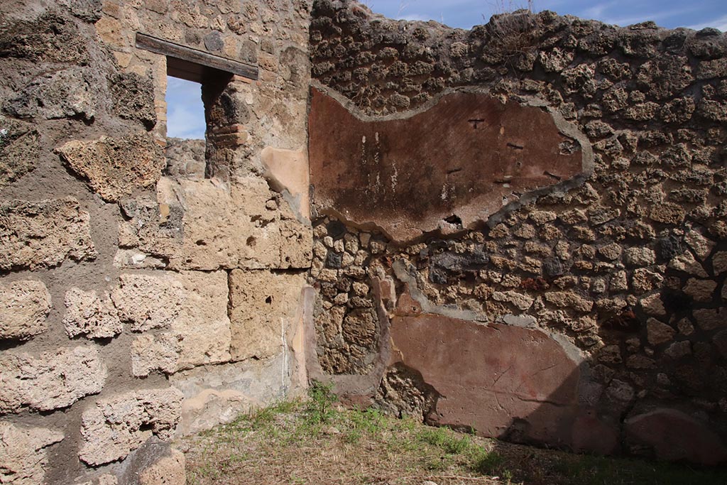 IX.7.22 Pompeii. October 2024.
Looking north-east through doorway into room on east side of bar-room. Photo courtesy of Klaus Heese.
