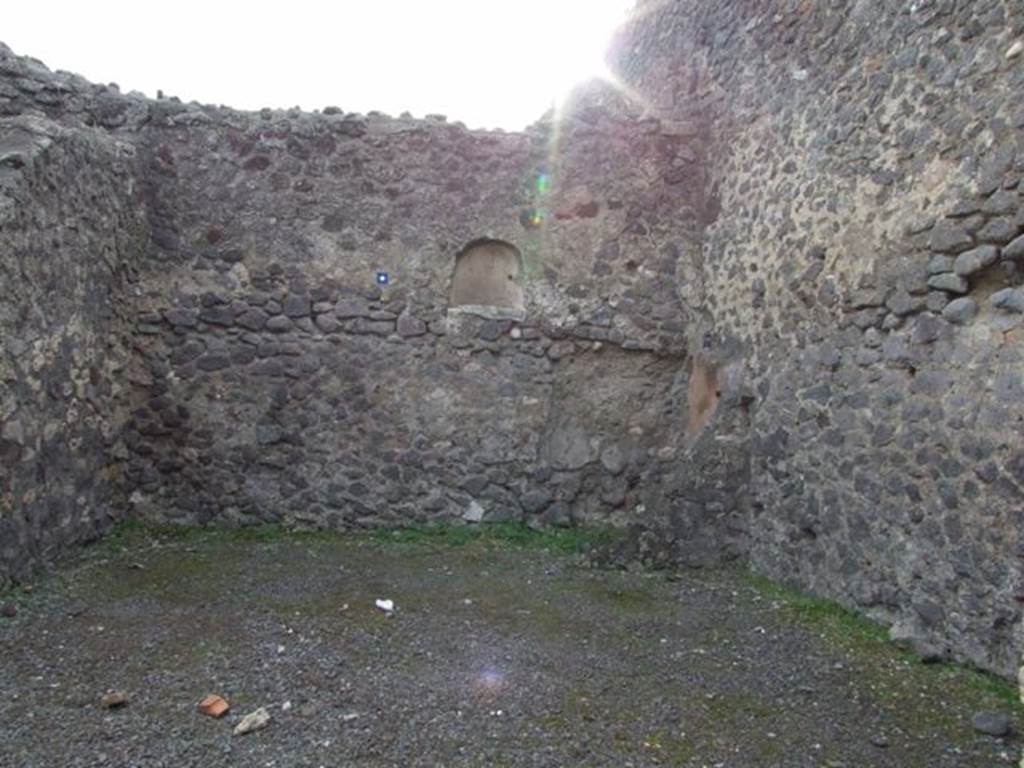 IX.8.1 Pompeii. December 2007. Looking towards south wall and niche in shop.