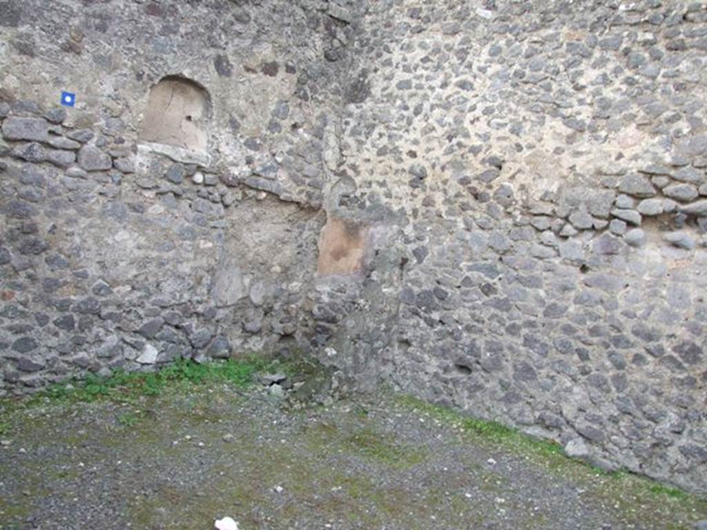 IX.8.1 Pompeii. December 2007. Looking towards south-west corner of shop, the site of the latrine under the stairs to the upper floor.