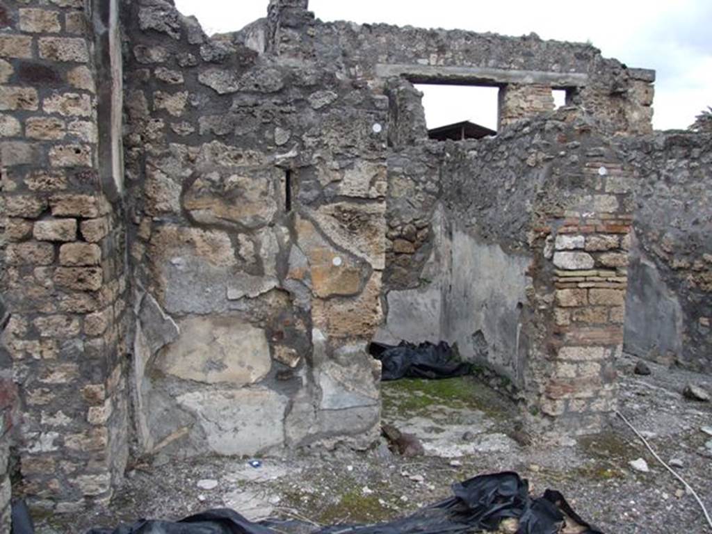 IX.8.6 Pompeii. March 2009. Doorway to Room 47, Small room or cupboard on west side of fauces of IX.8.3 Looking north.