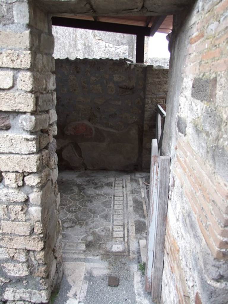 IX.8.6 Pompeii. March 2009. Room 54, east wall with small door to room 55, at south end of tablinum of IX.8.3.