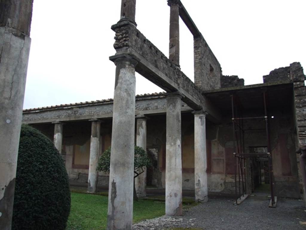 IX.8.6 Pompeii. March 2009. North west corner of Portico. Looking west.