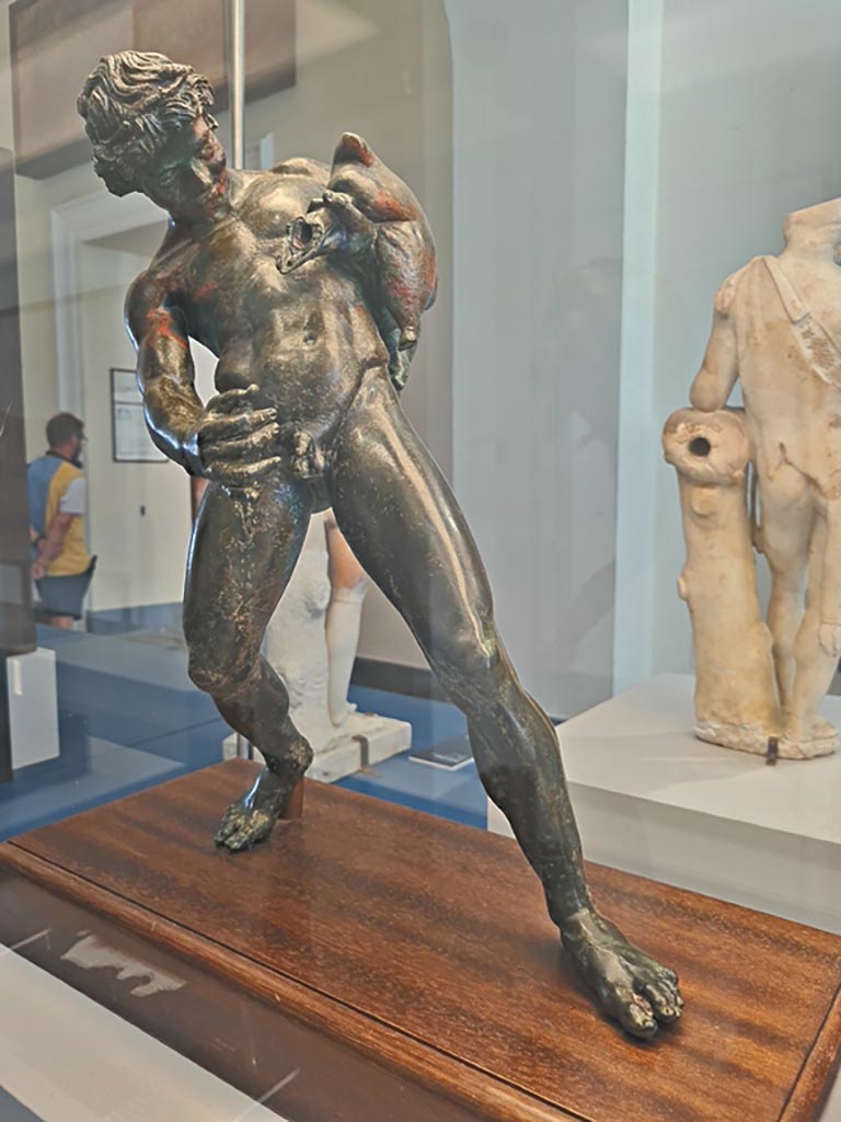 IX.8.6 Pompeii. October 2023.
Bronze fountain figure of a Satyr pouring wine, inv. 111495. Photo courtesy of Giuseppe Ciaramella.
On display in “L’altra MANN” exhibition, October 2023, at Naples Archaeological Museum.