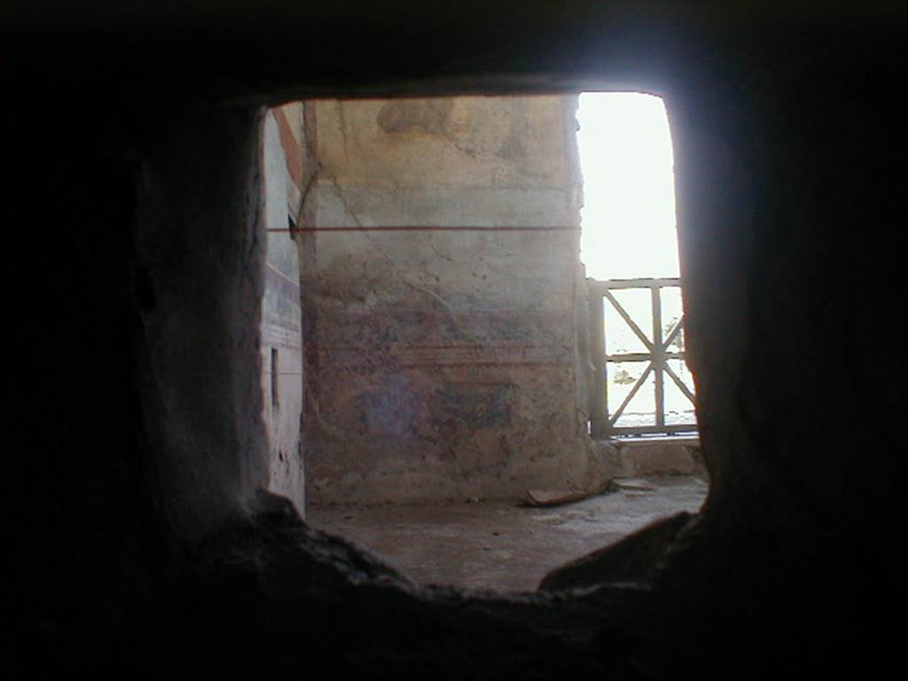 IX.8.6 Pompeii. September 2004. Room 18, Looking into Nymphaeum through duct in service corridor.