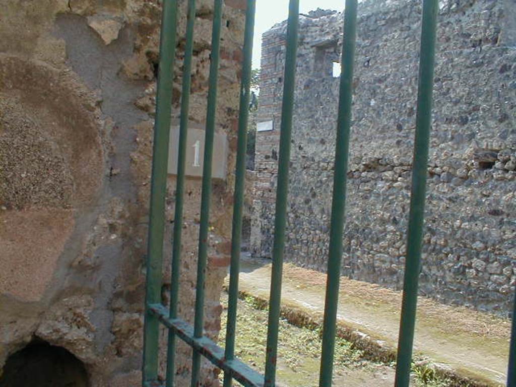 Looking out from IX.8.6 to Vico del Centenario. September 2004. (Door shown on map as IX.8.a – but possibly renumbered to IX.8.11?)