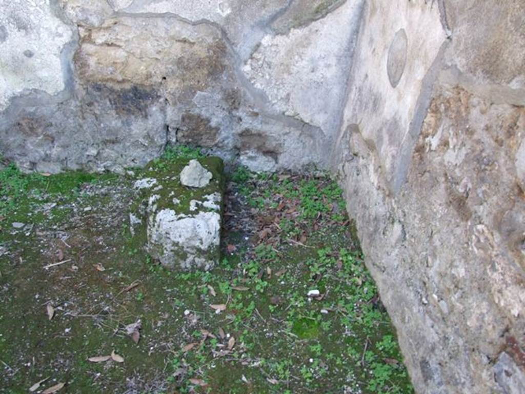 IX.8.7 Pompeii. March 2009. Remains of base of stairs to upper floor, against south wall.