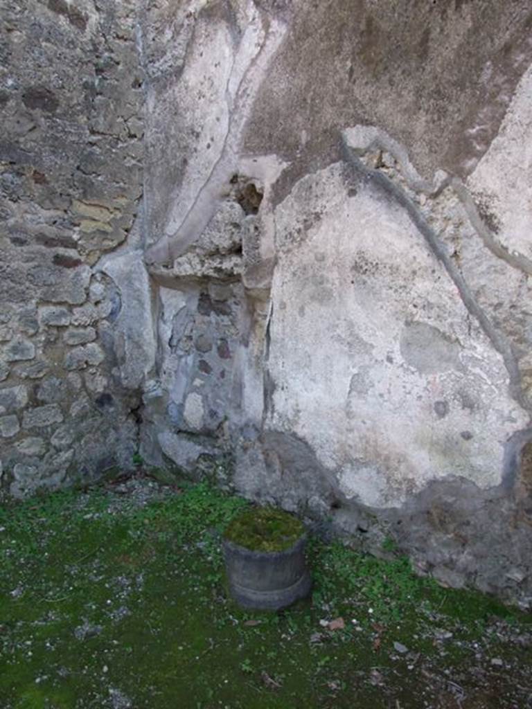 IX.8.7 Pompeii. March 2009. Niche in south east corner, under line of stairs in rear wall.