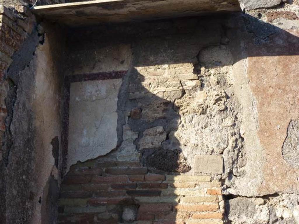 IX.9.8 Pompeii. June 2012. Upper east wall, remains of painted decoration in north-east corner. Photo courtesy of Michael Binns.