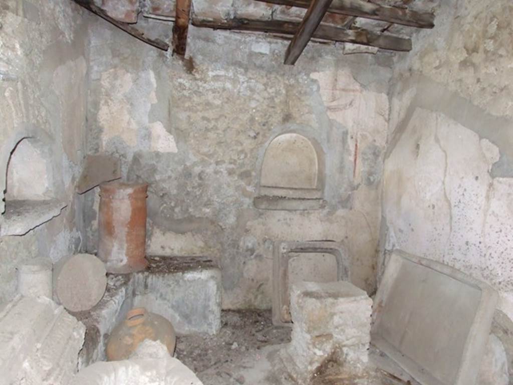 IX.9.10 Pompeii. March 2009. Sacellum, or former kitchen. Looking east. Room with three niches and an altar with a masonry bench along the north wall and the north east corner. See Boyce G. K., 1937. Corpus of the Lararia of Pompeii. Rome: MAAR 14. (459, PL 41,1)