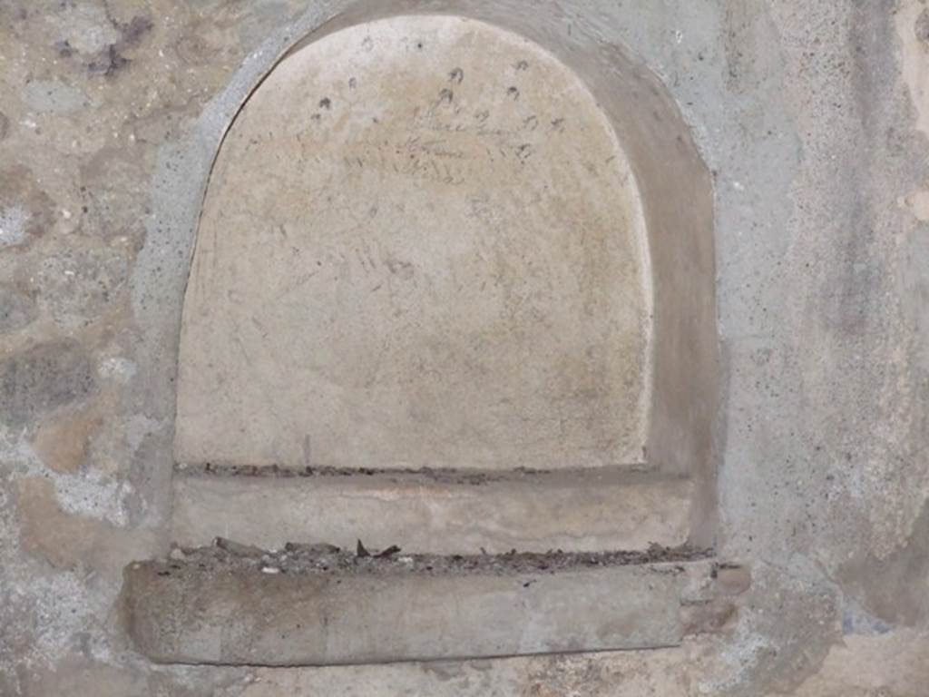 IX.9.10 Pompeii. March 2009. Lararium Niche on east wall. The shelf at the back of the niche contained a statuette of a female figure holding a patera umbilicata in her right hand. See Boyce G. K., 1937. Corpus of the Lararia of Pompeii. Rome: MAAR 14. (459, Pl 41,1)