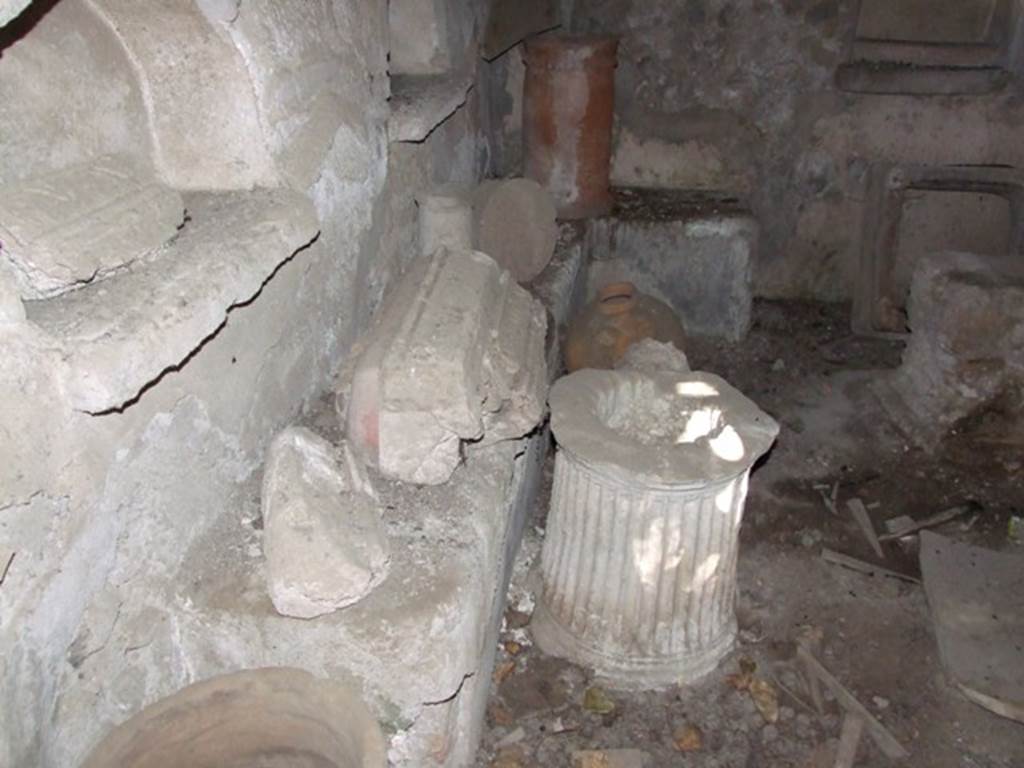 IX.9.10 Pompeii. March 2009. Masonry bench built along the north wall and part of the east wall.