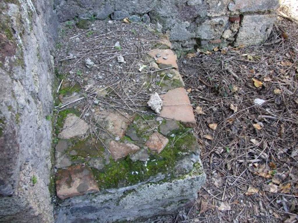 IX.9.11 Pompeii. March 2009. Room 1. Kitchen. Bench or hearth.