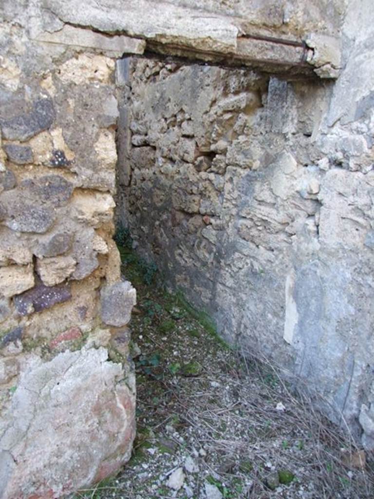 IX.9.13 Pompeii. March 2009. Doorway to Room 10. Latrine.
