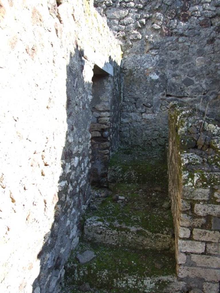 IX.9.a Pompeii. March 2009. Looking south to stairs to upper floor and doorway to Cubiculum "m" on east side.