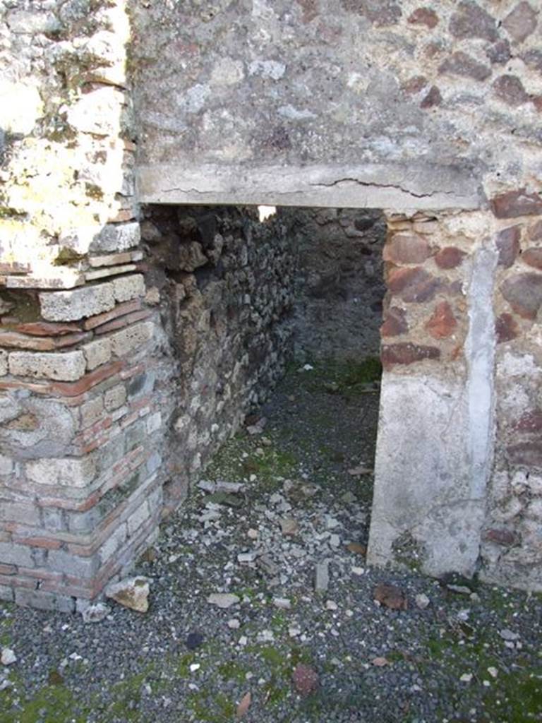 IX.9.a Pompeii. March 2009. Doorway to Kitchen and Latrine.