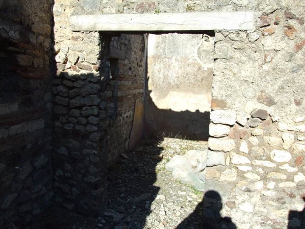 IX.9.a Pompeii. March 2009. Doorway to Cubiculum in south east corner, with window overlooking garden.