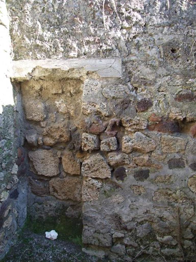 IX.9.b Pompeii. March 2009. Area under stairs. Looking south to blocked doorway.