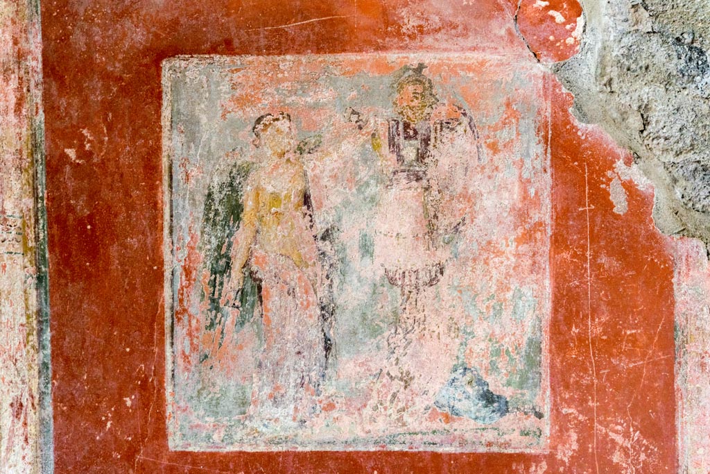 IX.9.c Pompeii. March 2023.
Central wall painting of Nike and a trophaeon from east wall of cubiculum. Photo courtesy of Johannes Eber.