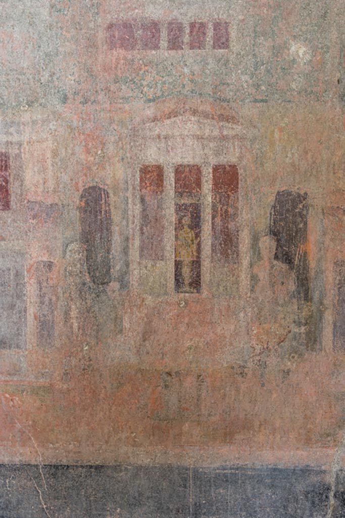 IX.9.c Pompeii. March 2023.
Detail of divinity and figures from centre of wall painting in middle of west wall.
Photo courtesy of Johannes Eber.