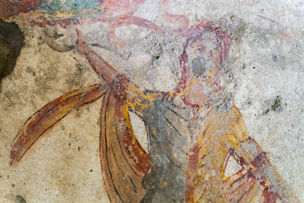 IX.9.c Pompeii. March 2023.
Detail of painted Lar from west side of painted altar on north wall of kitchen. Photo courtesy of Johannes Eber.