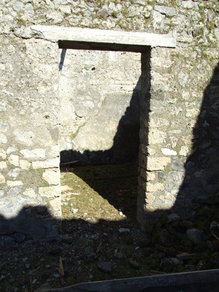 IX.9.f Pompeii. March 2009. Doorway to Tablinum (or Triclinium?) in south east corner of atrium.