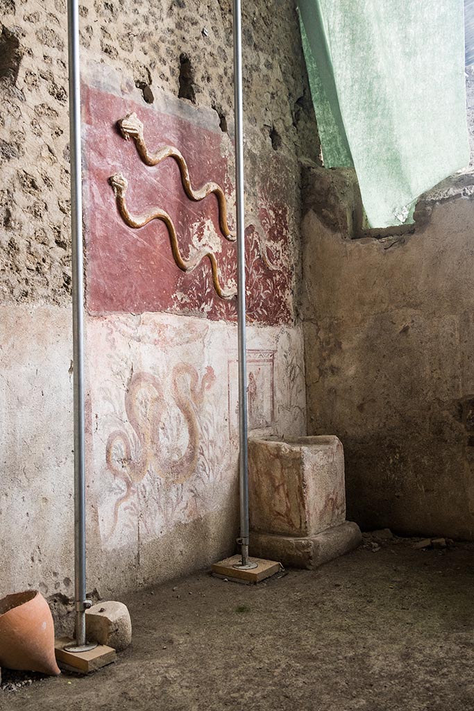 IX.10.1, Pompeii. July 2024. 
Room 12, altar and lararium at west end of south wall. Photo courtesy of Johannes Eber.

