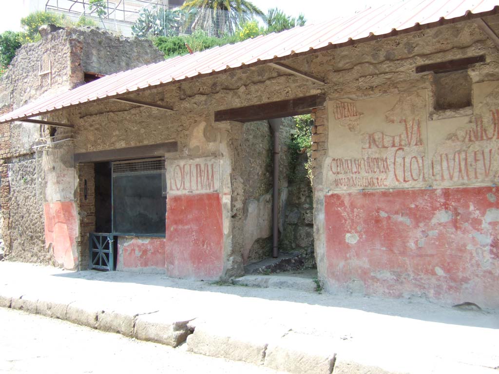 IX.11.2 and IX.11.3 Pompeii. May 2006. Entrances on Via dell’Abbondanza.
