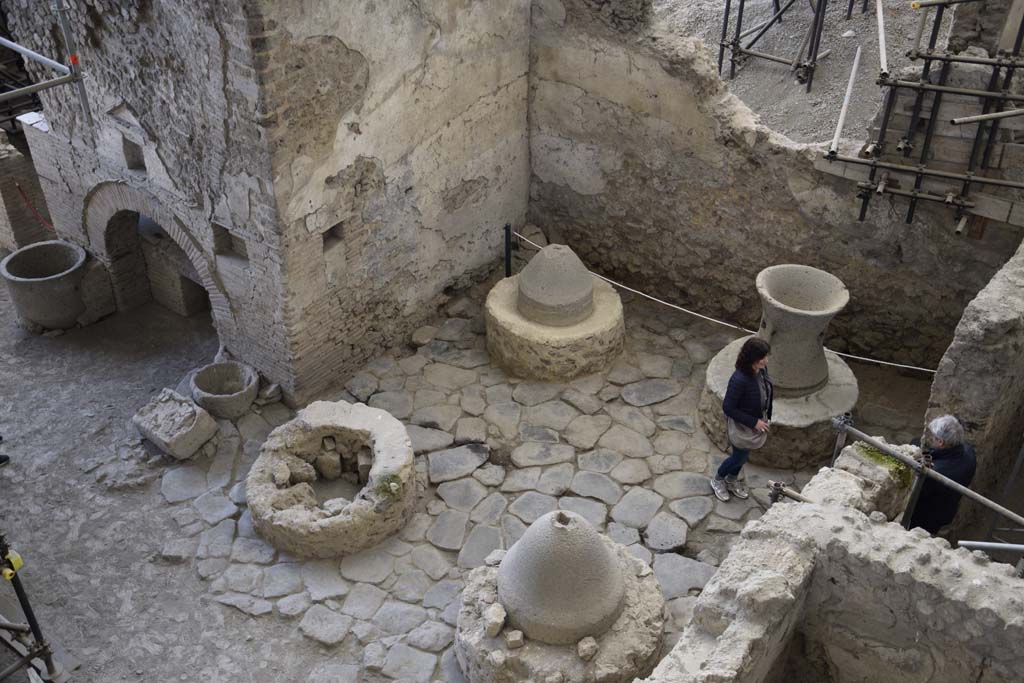 IX.12.6 Pompeii. February 2017.
Room “f”, the bakery, looking south-west towards north side of oven “d”, from above. Photo courtesy of Johannes Eber.