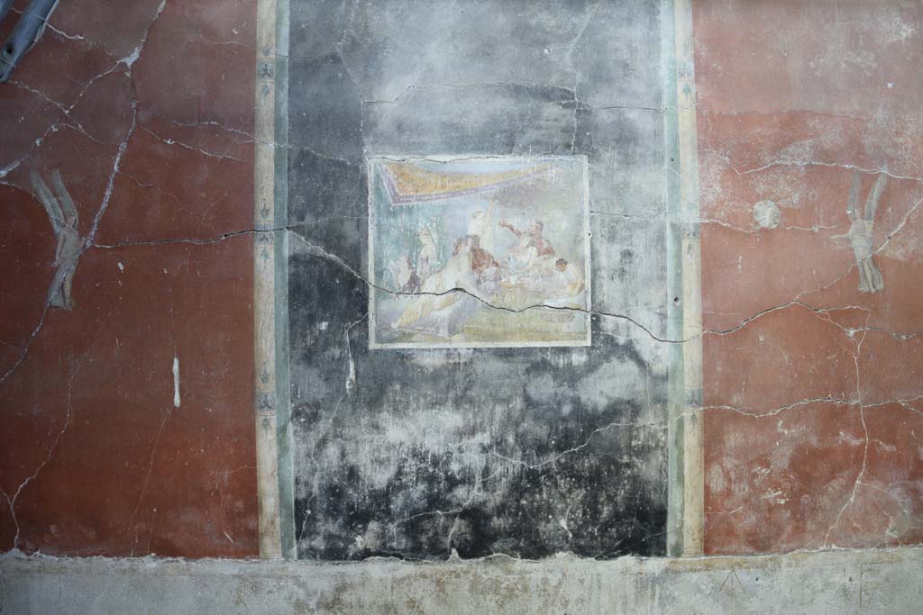 IX.12.6 Pompeii. February 2017.
Room “m”, painting in centre of north wall with banqueting scene. Photo courtesy of Johannes Eber.