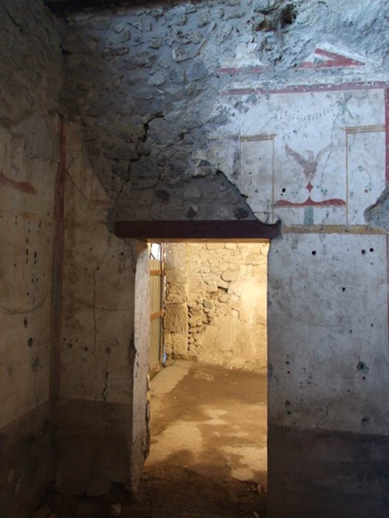 IX.12.6 Pompeii. March 2009. Room “c”, west wall with doorway to room “b”.