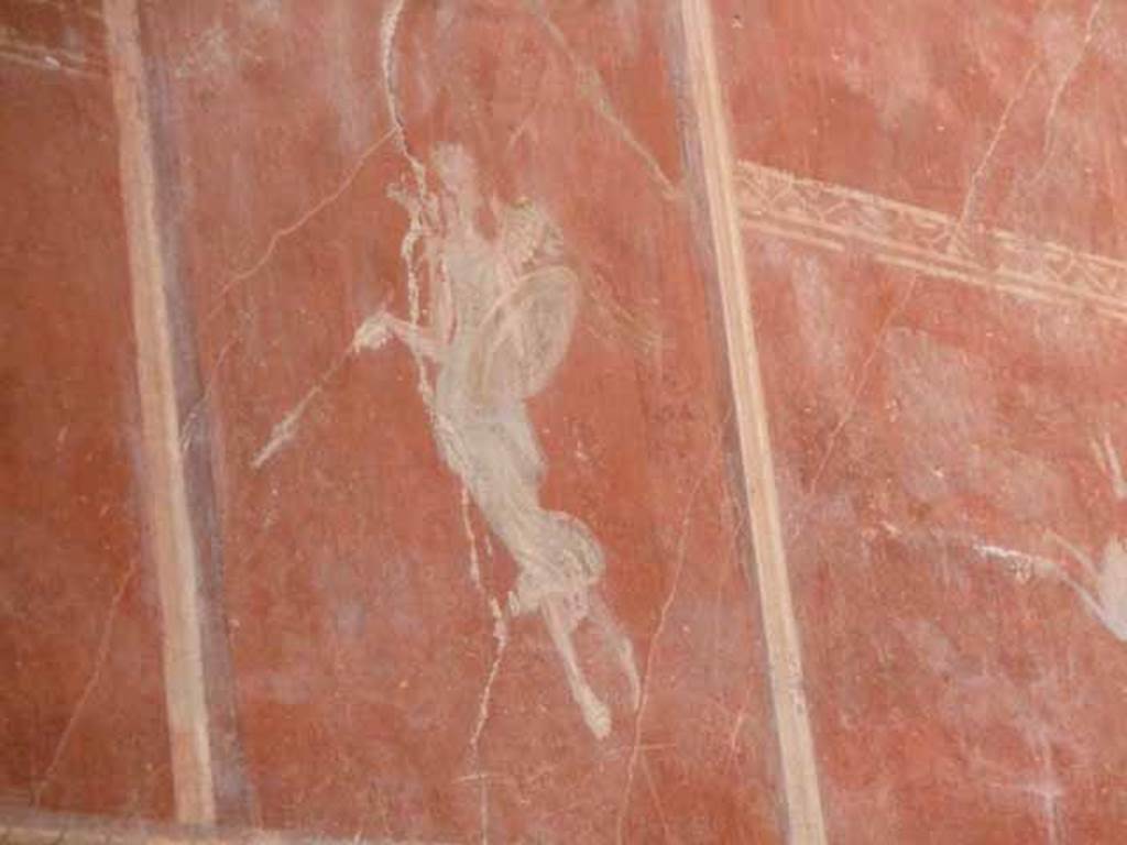 IX.12.9 Pompeii. May 2010. Room 3, north wall, upper zone. Painting of floating figure with spear and shield.